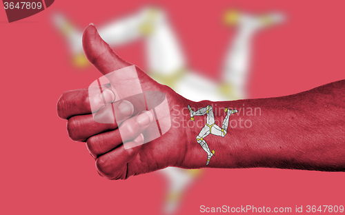 Image of Old woman with arthritis giving the thumbs up sign