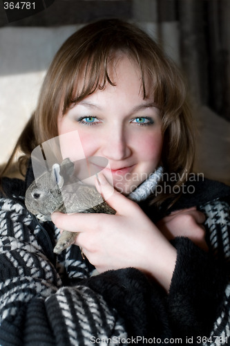 Image of beautiful women and rabbit