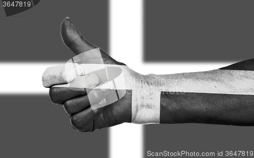 Image of Old woman with arthritis giving the thumbs up sign