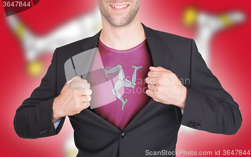 Image of Businessman opening suit to reveal shirt with flag
