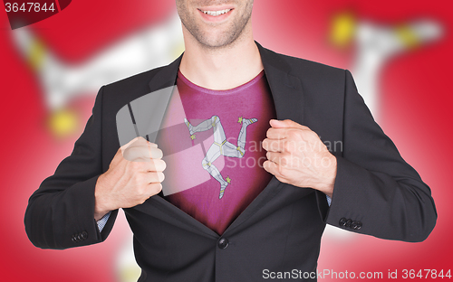 Image of Businessman opening suit to reveal shirt with flag