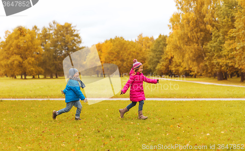 Image of group of happy little kids running outdoors