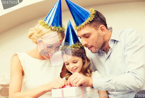 Image of happy family with gift box