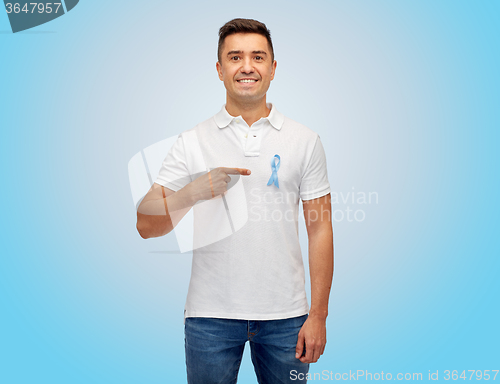 Image of smiling man with prostate cancer awareness ribbon
