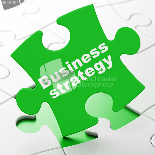 Image of Business concept: Business Strategy on puzzle background