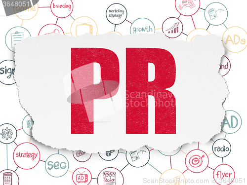 Image of Marketing concept: PR on Torn Paper background