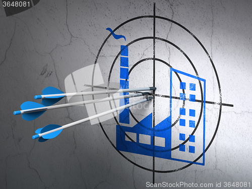 Image of Business concept: arrows in Industry Building target on wall background