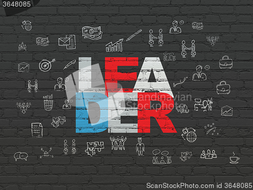 Image of Business concept: Leader on wall background