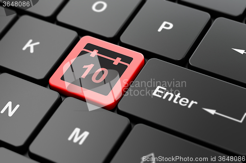 Image of Time concept: Calendar on computer keyboard background