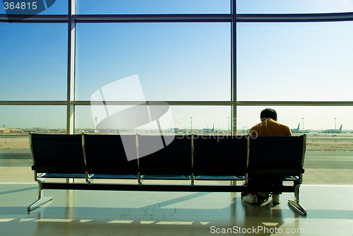 Image of Lonely airport passenger
