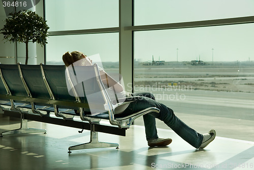 Image of Lonely girl waiting in airport