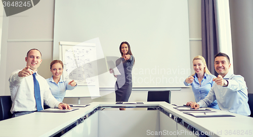 Image of group of businesspeople pointing finger at you