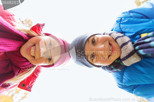 Image of happy boy and girl faces