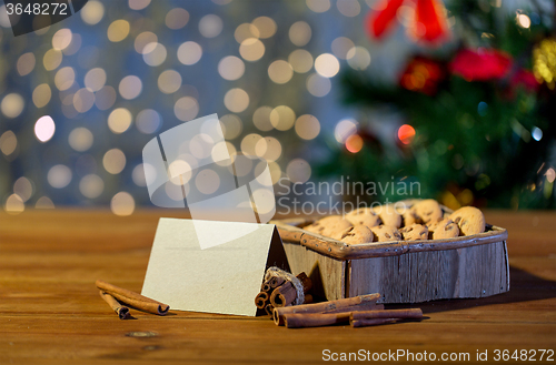 Image of close up of christmas oat cookies on wooden table