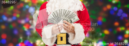 Image of close up of santa claus with dollar money