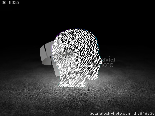 Image of Business concept: Head in grunge dark room