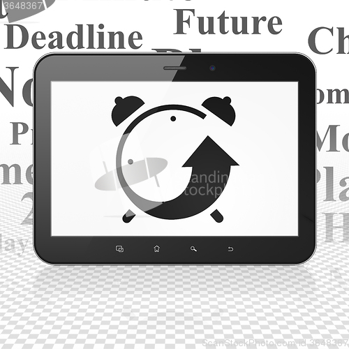 Image of Time concept: Tablet Computer with Alarm Clock on display