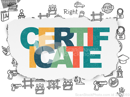 Image of Law concept: Certificate on Torn Paper background