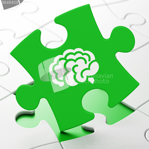 Image of Science concept: Brain on puzzle background