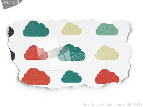 Image of Cloud computing concept: Cloud icons on Torn Paper background