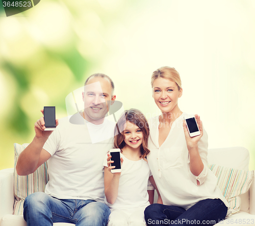 Image of happy family with smartphones