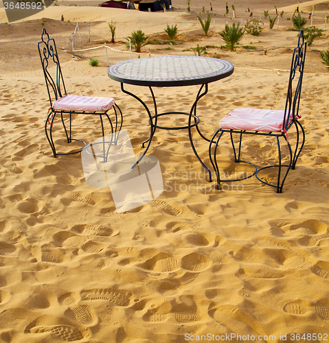 Image of table and seat in desert  sahara morocco    africa yellow sand