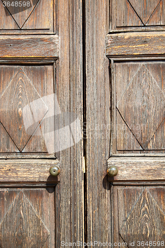 Image of stripped paint  door    in italy     traditional  texture nail