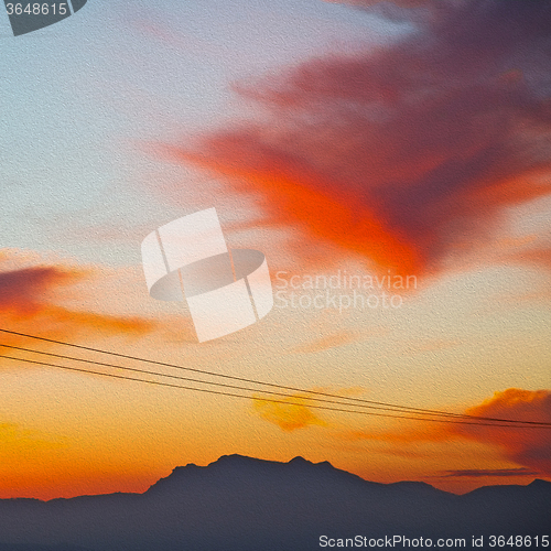 Image of mountain in morocco africa   current cables     and red sunrise