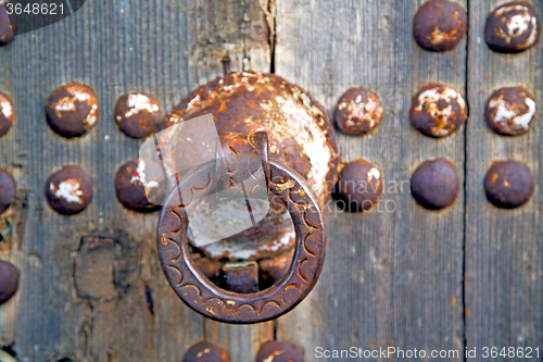 Image of brown  morocco in africa the old wood  facade home and rusty saf