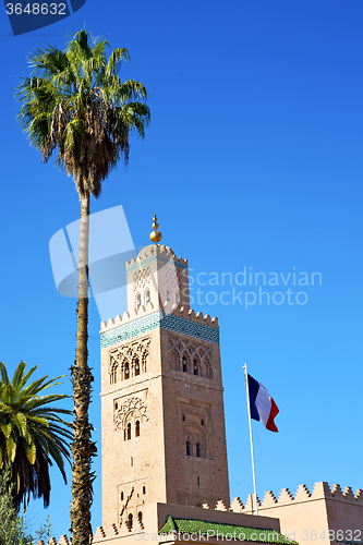 Image of history in maroc africa  minaret religion french waving flag