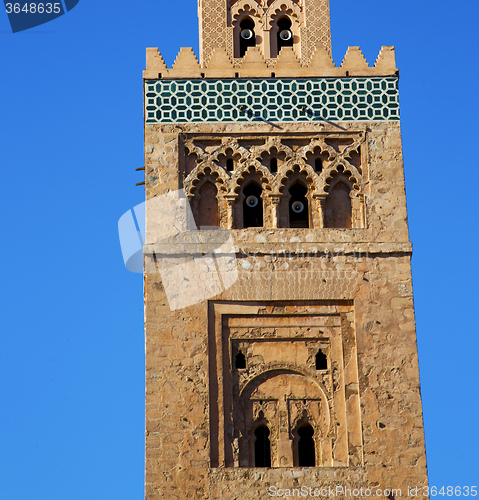 Image of history in maroc africa  minaret religion and the blue     sky