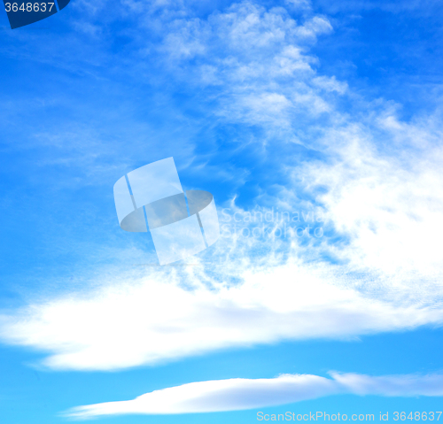 Image of in the blue sky white soft clouds and abstract background