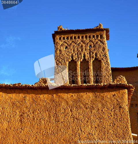 Image of africa  in histoycal maroc  old construction  and the blue cloud