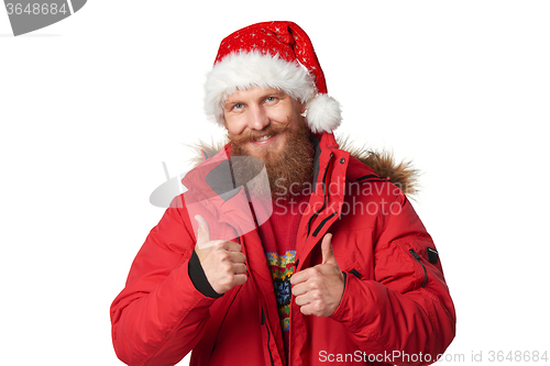 Image of bright picture of handsome man in christmas hat.