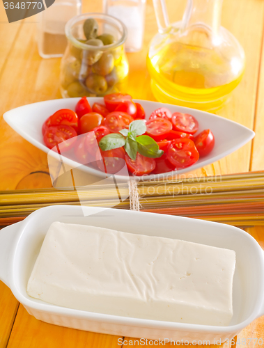 Image of cheese, pasta and tomato