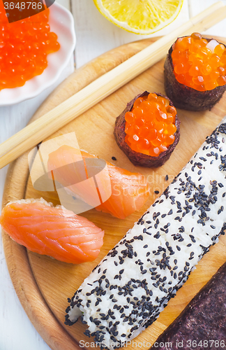 Image of Fresh rolls and sushi with salmon