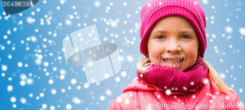 Image of happy little girl portrait over snow background