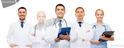 Image of group of doctors with tablet pc and clipboard