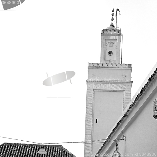 Image of old   brick tower in morocco africa village and the sky