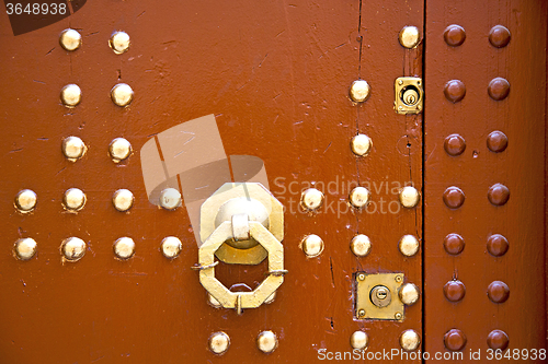 Image of   in africa the old wood  facade home  safe padlock 