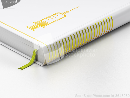 Image of Health concept: closed book, Syringe on white background