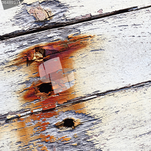 Image of Old boat with peeling paint background texture