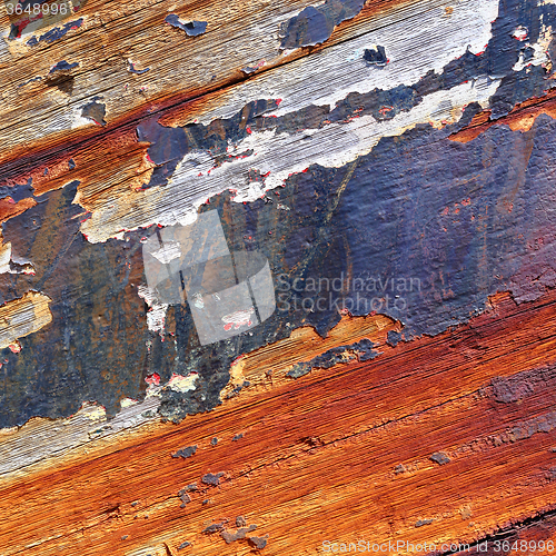 Image of Old boat with peeling paint background texture