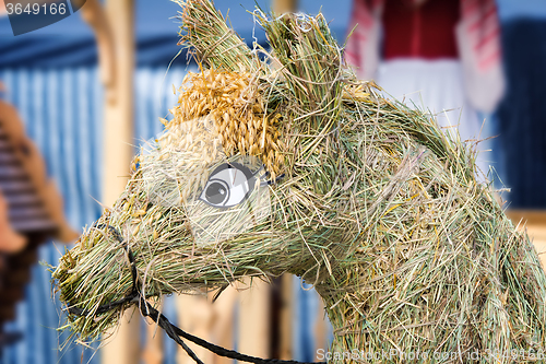 Image of Figurine made of straw in the form of a horse.