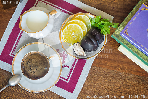 Image of Still life : a Cup of black coffee on the table.