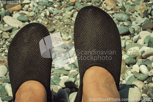 Image of Comfortable shoes for the beach and swimming in the sea.