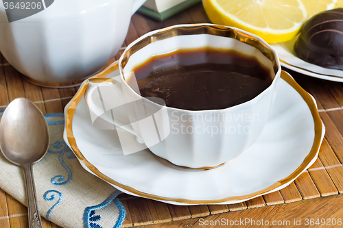 Image of Still life : a Cup of black coffee on the table.