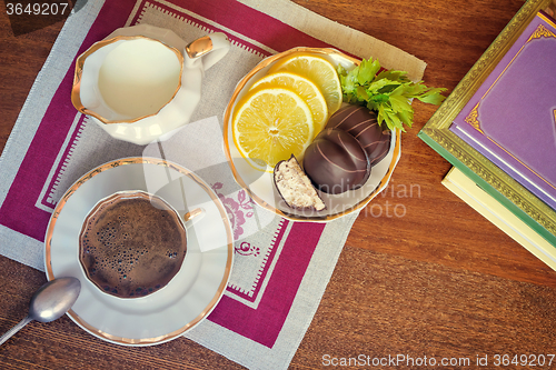 Image of Still life : a Cup of black coffee on the table.