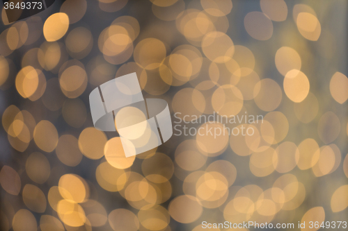 Image of blurred golden lights bokeh