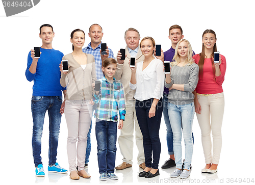 Image of group of smiling people with smartphones